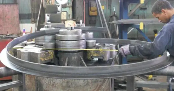 Industrial metal machine parts arranged for mechanical processing.