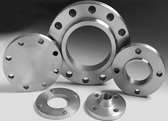 A collection of metal flanges with bolt holes in various sizes.