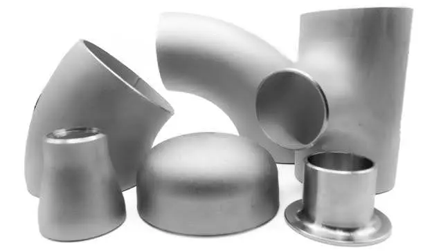 Various metal pipe fittings including elbows, caps, and flanges.