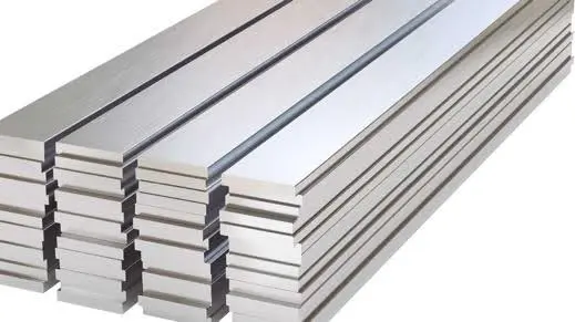 Stack of shiny stainless steel bars.