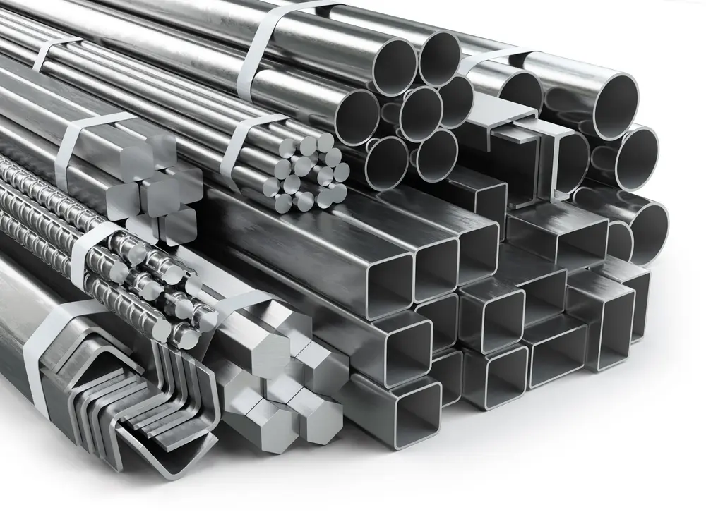 Stack of various metal pipes and bars in different shapes and sizes.
